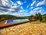 Piscina de borda infinita com vista panor�mica no s�tio em Sales�polis