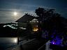 Quiosque junto � piscina iluminado ao luar no s�tio em Sales�polis