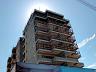 Obra do Residencial Jardins de Nazar� com estande de vendas no Massagua�u
