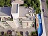 Perspectiva a�rea do Residencial Jardins de Nazar� com �rea de lazer e piscina na Praia do Massagua�u em Caraguatatuba
