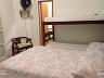 Su�te familiar com cama de casal e beliche no sobrado