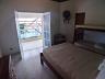 Su�te com acesso direto � varanda no sobrado do Massagua�u