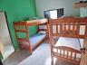 Su�te espa�osa com beliches no im�vel em Caraguatatuba