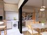 Perspectiva ilustrativa da varanda gourmet integrada � cozinha americana do apartamento de 43,87 m�
