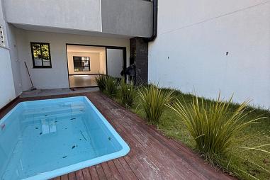 Sobrado com piscina e 3 suítes