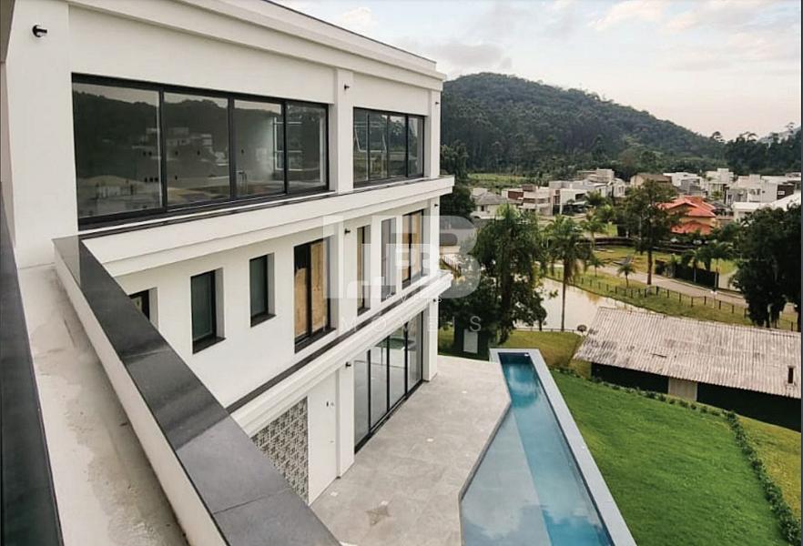 Casa com 5 suítes no condomínio Haras Rio do Ouro. — foto 2