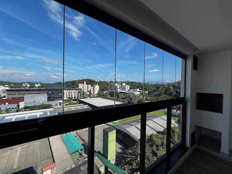 Apartamento Tipo 03: Sacada com churrasqueira