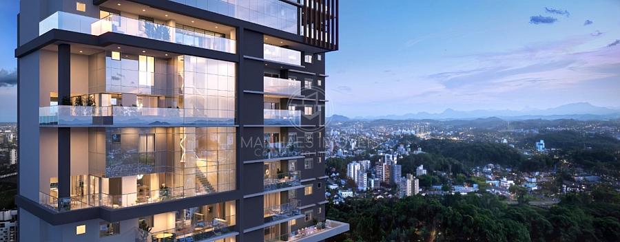 ONE | Detalhe da fachada noturna dos Apartamentos Duplex