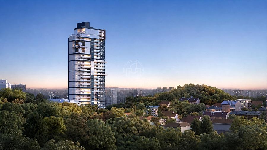 Vista da torre do edif�cio ONE e entorno verde ao entardecer