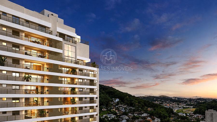 Perspectiva arquitet�nica noturna dos apartamentos do Aman iluminados, com vista para a cidade e a serra no Bairro Am�rica em Joinville