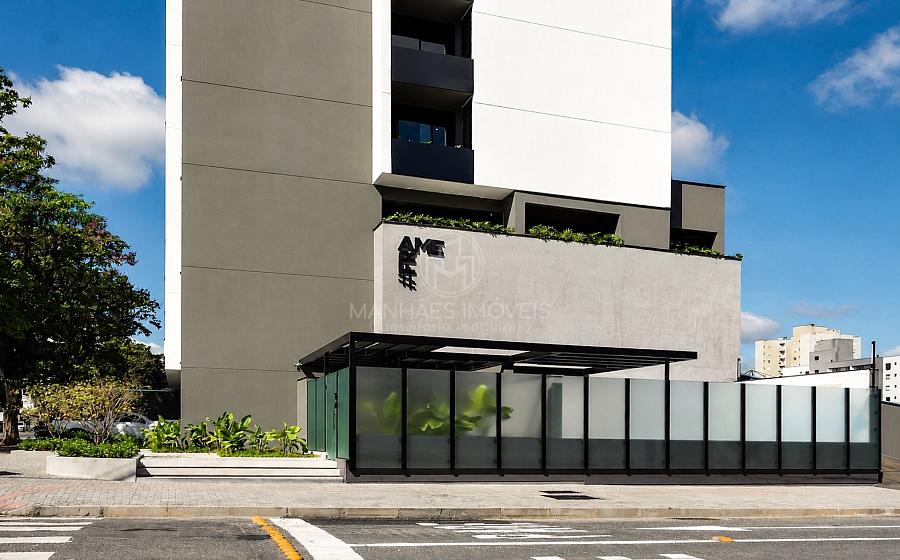 Fachada do embasamento e portaria com acesso seguro do Edif�cio Frame na Rua Conc�rdia