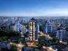 Vista a�rea noturna panor�mica do ONE iluminado no horizonte do bairro Atiradores em Joinville