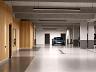 Garagem com conceito Plaenge Parking Design e piso com pintura ep�xi