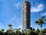 Vista frontal completa da torre de 30 pavimentos do empreendimento Cor� emoldurada por palmeiras na Praia da Arma��o em Penha SC