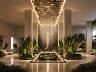 Exclusivo hall de entrada que combina a sofistica��o de um espelho d'�gua monumental a uma impressionante cascata de luzes e design biof�lico