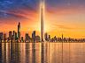Vista panor�mica do skyline de Balne�rio Cambori� ao p�r do sol destacando a torre iluminada do Senna Tower