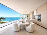 Living com cozinha gourmet integrada e vista panor�mica para o mar