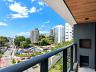 Sacada com churrasqueira do apartamento com 3 quartos