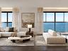 Amplo living da cobertura duplex enquadrando o mar em m�ltiplos pain�is de vidro