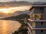 Vista panor�mica da orla e do p�r do sol a partir dos andares superiores do Amaran, em Penha