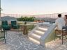Lounge externo e acesso a piscina