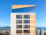 25� pavimento: Fachada do topo do Essenza, destacando o rooftop de lazer