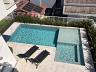 CASA COM 3 SU�TES, PISCINA E PORTEIRA FECHADA NO BAIRRO AMIZADE 37