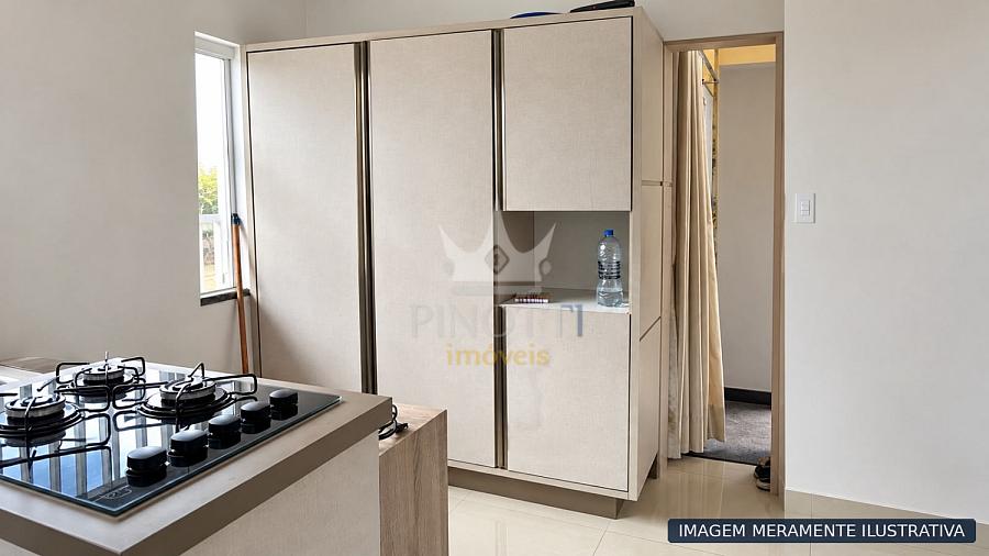 Imagem ilustrativa da cozinha, com arm�rio de portas de correr e bancada com cooktop