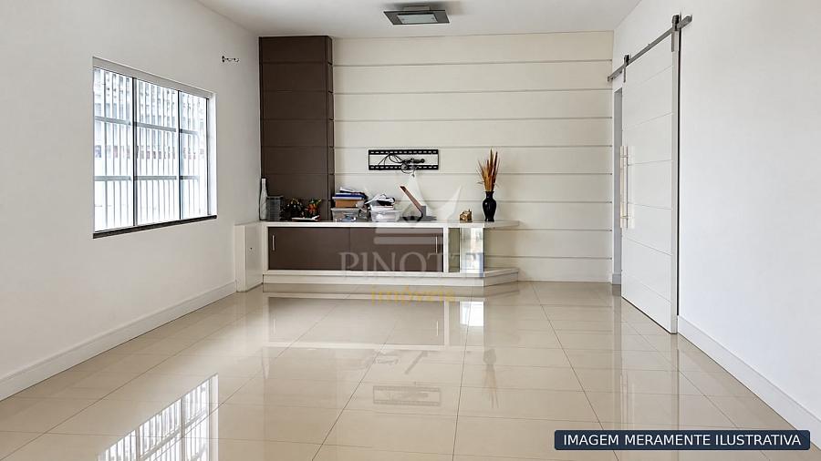 Imagem ilustrativa da sala, com painel para TV, janela ampla e porta de correr