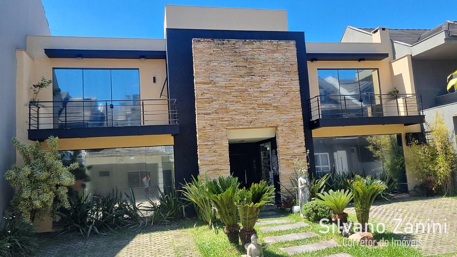 Casa em condom�nio no Ecoville com 3 su�tes, amplo p�tio e 4 vagas 1