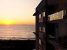 Imagine acordar ao som do mar, apreciar o nascer do sol da sacada do seu apartamento 1